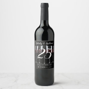 Glasses of red wine on black label