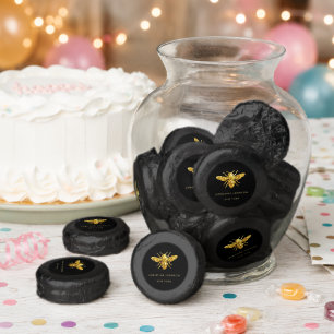 glitter bee logo on black dipped oreo cookie favors