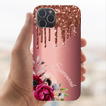 Glitter bronze copper metallic monogram floral Case-Mate iPhone 14 case<br><div class="desc">Faux bronze glitter drip,  paint dripping look on faux copper metallic looking background. Burgundy and rose gold colored florals,  flowers. Personalize and add Your name.  The name in rose gold is written with a modern and trendy hand lettered style script.</div>