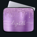 Glitter Purple Drips Monogrammed Laptop Sleeve<br><div class="desc">Monogrammed chic and girly laptop sleeve featuring purple faux glitter drips on a purple faux brushed metallic background. Personalize with your name in a stylish trendy white script with swashes.</div>