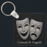 Glittery Comedy & Tragedy Drama Mask Keychain<br><div class="desc">Celebrate the art of drama with this elegant design featuring sparkling comedy and tragedy theater masks. The shimmering silver texture creates a luxurious, eye-catching look perfect for actors, performers, theater lovers, and anyone who appreciates the world of stage and storytelling. Ideal for gifts, events, décor, or customizable products inspired by...</div>