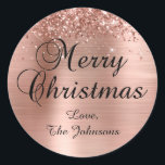 Glittery Rose Gold Foil Merry Christmas Family Classic Round Sticker<br><div class="desc">Fancy calligraphy Merry Christmas envelope seal stickers for your holiday greeting cards.
Customize the font size or style for your family name as needed.
The sparkly rose gold glitter and brushed metallic style foil are digital art elements that print like a photo.</div>