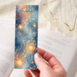Glowing Floral Sparkle Fantasy Bookmarks<br><div class="desc">This glowing floral sparkle fantasy design features radiant golden flowers floating in a swirl of twinkling lights and dreamy stardust. The deep blue and peachy tones create a magical contrast that feels both soothing and powerful. Customize it with any name to make a one-of-a-kind gift for anyone who loves celestial...</div>