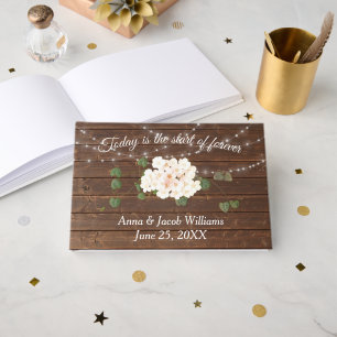 Glowing Lights and Hydrangea Flower On Oak Wood Guest Book