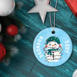 Glowing Lights Winter Wonders Snowman Christmas Ceramic Ornament<br><div class="desc">Elevate your holiday decor with our enchanting "Glowing Winter Wonders" Christmas Stocking. This delightful stocking is a captivating addition to your festive ambiance, boasting a playful design that encapsulates the enchanting spirit of the Christmas season. The front of the stocking features an endearing snowman tangled in glowing lights, radiating the...</div>