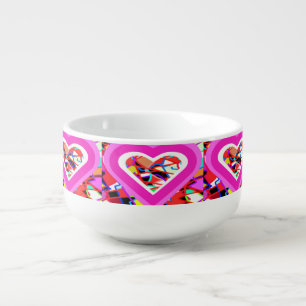Glowing love hearts on a mosaic pattern soup mug