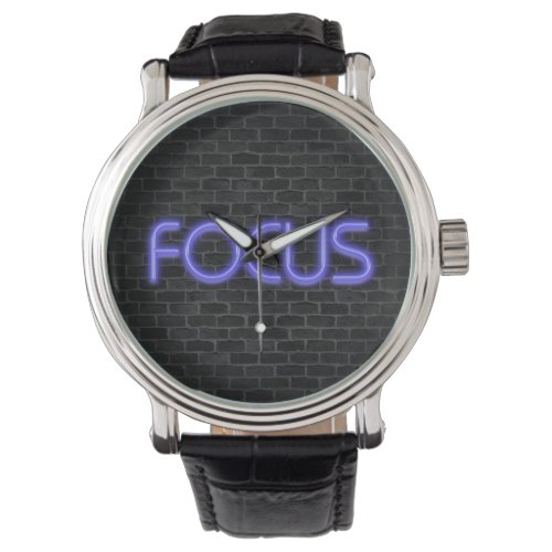 glowing neon Focus text on brick Watch