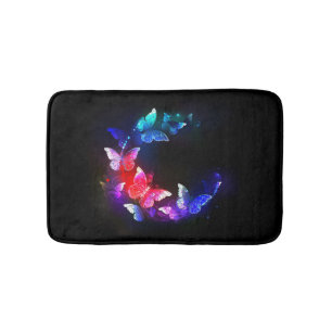 Glowing Neon Night Butterflies on Black background Bath Mat