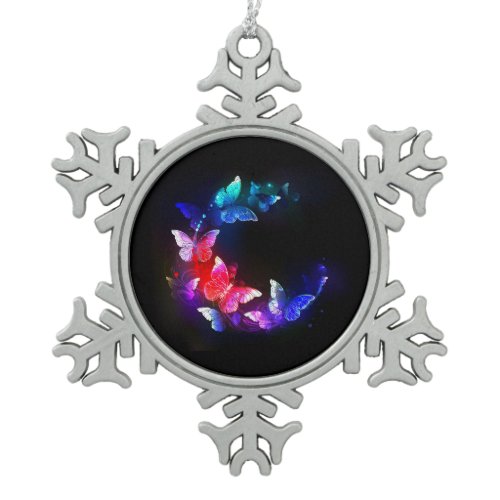 Glowing Neon Night Butterflies on Black background Snowflake Pewter Christmas Ornament