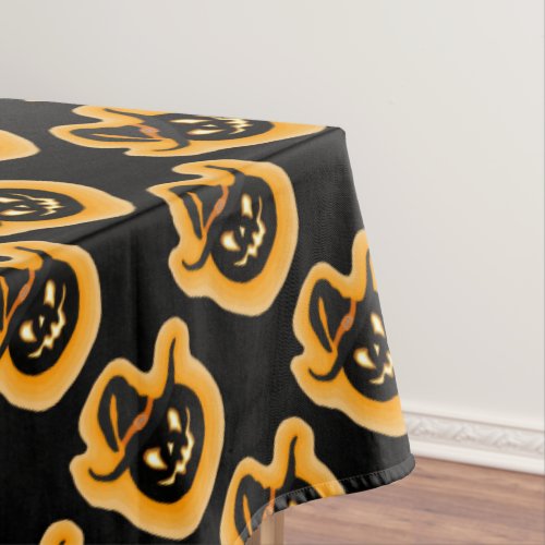 Glowing Pumpkin Witch On Black Tablecloth