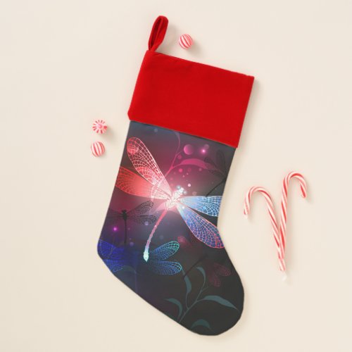 Glowing red dragonfly christmas stocking