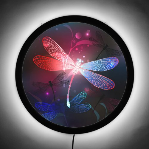 Glowing red dragonfly LED sign