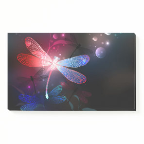 Glowing red dragonfly post-it notes