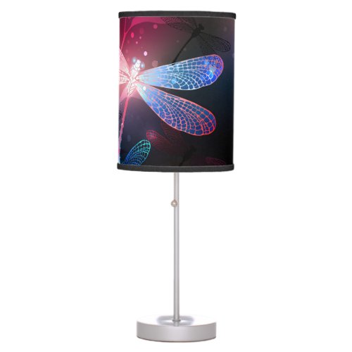 Glowing red dragonfly table lamp