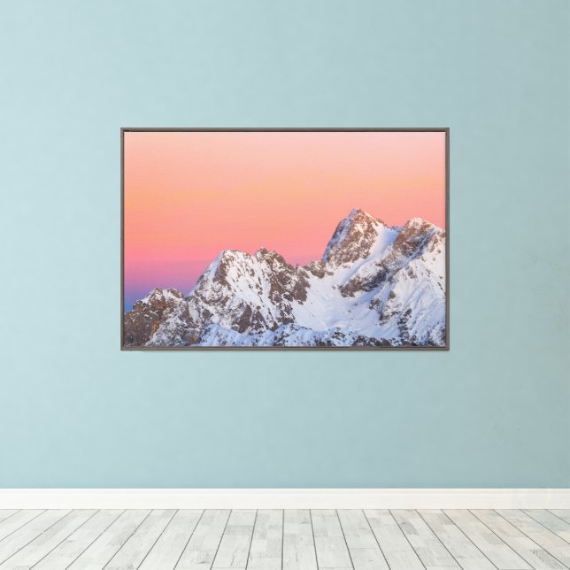 Glowing sunset sky and snowy mountains canvas print (Insitu(Wood Floor))