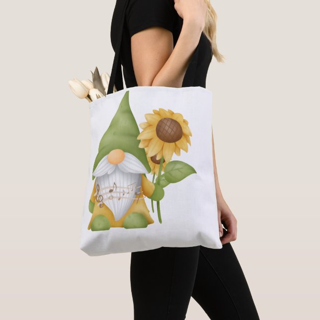 Gnome Holding a Sunflower and Notes on a Tote Bag (Close Up)