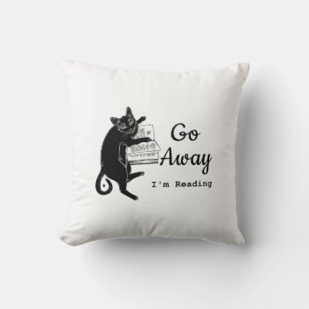 Go Away I'm Reading Cat Throw Pillow by Victoreeah at Zazzle