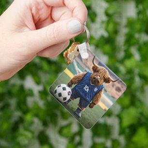 "Goal-Getter: A Highland Cow Dressed for Soccer" Keychain