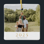 Gold 2025 Single Photo Christmas Ceramic Ornament<br><div class="desc">Modern minimalist festive design with gold faux foil "2025",  single photo ornament. Backing features solid festive cranberry red color.</div>