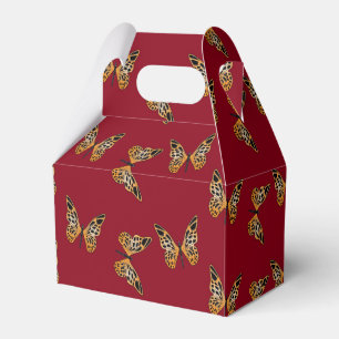 Gold and black butterflies on maroon favor boxes