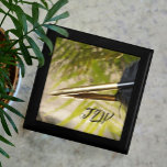 Gold and Black Feather Quill Pen wooden keepsake Gift Box<br><div class="desc">This wooden jewelry keepsake box with gold and black feather quill fountain pen reflected against a gold and green background is an ideal gift for the writer in your life. Personalize with initials, it is a unique gift to be treasured for keeping jewelry, keepsakes or treasures inside. A sophisticated style,...</div>