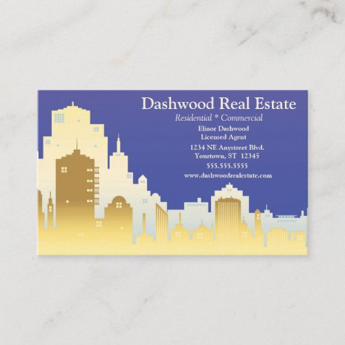 Gold and Cream Skyline Blue Background Real Estate Business Card