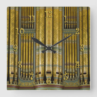 Gold and green organ pipes clock