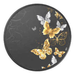 Gold and white butterflies hockey puck