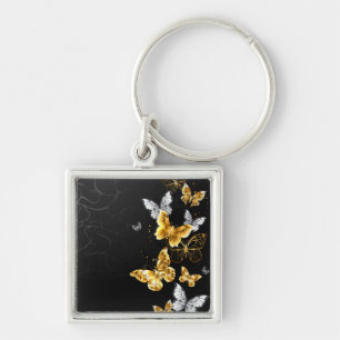 Gold and white butterflies keychain