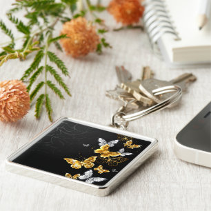 Gold and white butterflies keychain