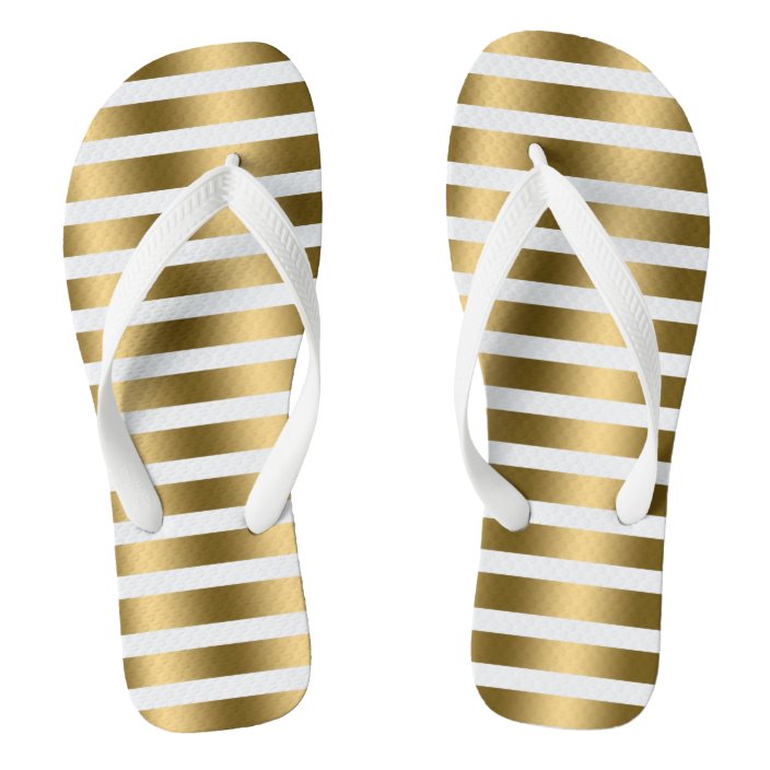 white and gold flip flops