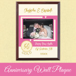 Gold Anniversary 50 years photo names pink Award Plaque<br><div class="desc">Gold anniversary keepsake wood plaque.
A gift for the happy couple celebrating 50 years together.
Add a photo,  names and the established date / year.
Gold,  ivory and pink with love hearts.</div>
