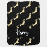 Gold bats on black baby blanket