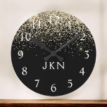 Gold Black Glitter Monogram Girly Initials Round Clock<br><div class="desc">Black and Gold Sparkle Glitter Brushed  Monogram Name Clock. This makes the perfect sweet 16 birthday,  wedding,  bridal shower,  anniversary,  baby shower or bachelorette party gift for someone that loves glam luxury and chic styles.</div>