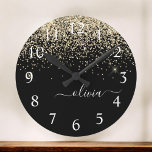 Gold Black Glitter Script Monogram Girly Name Round Clock<br><div class="desc">Black and Gold Sparkle Glitter Brushed Script Monogram Name Clock. This makes the perfect sweet 16 birthday,  wedding,  bridal shower,  anniversary,  baby shower or bachelorette party gift for someone that loves glam luxury and chic styles.</div>