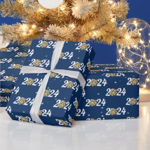 Gold Christmas Bow for 2024 on Blue Wrapping Paper