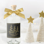 Gold Christmas Trees Warmest Wishes Holiday Liquor Bottle Label<br><div class="desc">These liquor bottle labels are perfect for giving the gift of spirits this holiday season. The festive design features fancy text reading: Warmest Wishes, and three gold spiral Christmas trees fashioned to look like they're made from ribbons and stars on a black background. There is space for your signature and...</div>