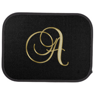 Gold-colored initial A on black Car Floor Mat