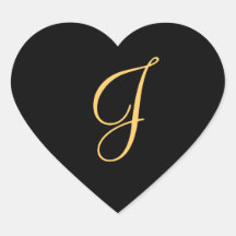 Gold-colored initial J on black monogram sticker