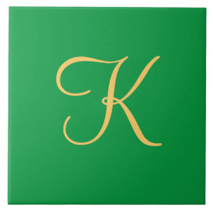 Gold-colored initial K on solid green background Ceramic Tile