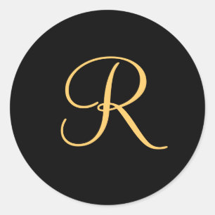 Gold-colored initial R on black monogram sticker