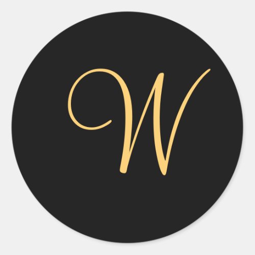 Gold_colored initial W on black monogram sticker