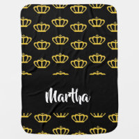 Gold crowns on black baby blanket