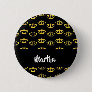 Gold crowns on black button