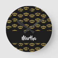 Gold crowns on black round clock