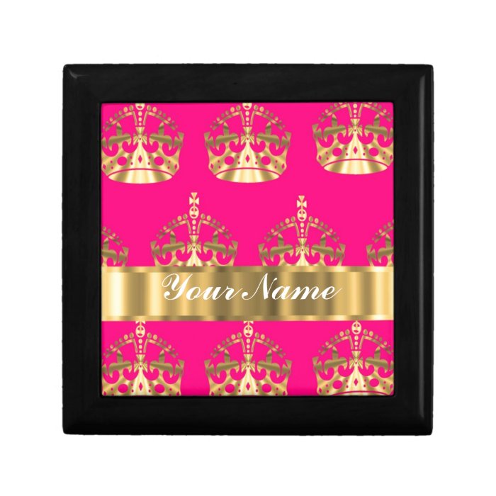 Gold crowns on hot pink jewelry boxes