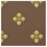 Gold Cruciferous Flower on Brown Fabric