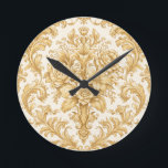 Gold Damask Floral Round Clock<br><div class="desc">This exquisite round clock features a captivating gold floral damask pattern,  perfect for adding a touch of elegance to any room. Its timeless design and intricate details make it a stunning statement piece,  ideal for those who appreciate classic and sophisticated home décor.</div>