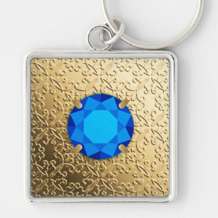 Gold Damask with a faux sapphire gemstone Keychain