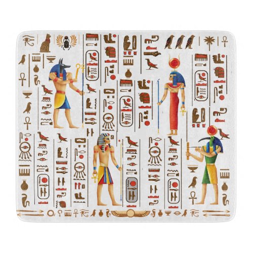 Gold Egyptian hieroglyphs and deities on black  Cutting Board